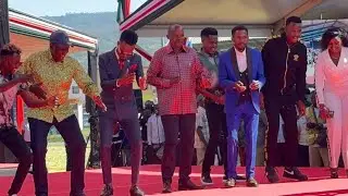PRESIDENT WILIAM RUTO AND KASOLO ENTRANCE AT MACHAKOS NYOTA FUND LAUNCH 
