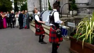 hokey cokey bagpipes and drums