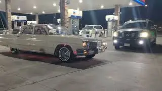 white Impala with curb feelers