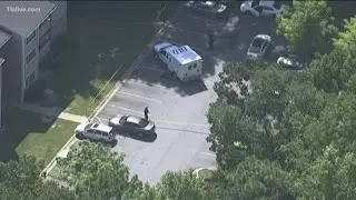 Tucker High student arrested at school, charged in deadly apartment shooting