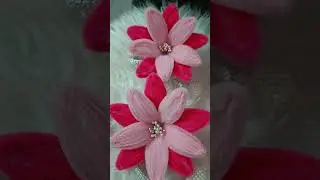 delicately crafted curtain tie in pink made of fuzzy wire