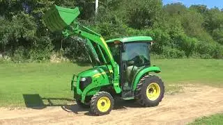2009 JOHN DEERE 3520 4X4 TRACTOR WITH LOADER AND FACTORY CAB!