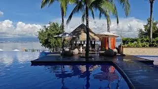 Dusit Thani Mactan, pool and beach stroll