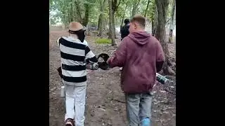 Cousins paintball.  Chase in striped shirt.