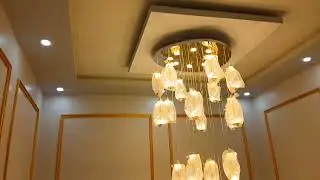 Luxury Black Marble Staircase with Golden Wall Design | Stylish Chandelier Look