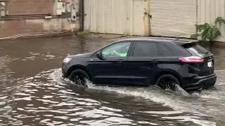 RAW: Drivers navigate flooded streets in the Mapunapuna area