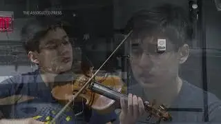 Champion says Rubik's Cube, violin go hand in hand