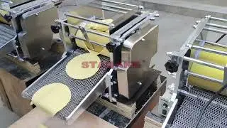 Corn tortilla making machine