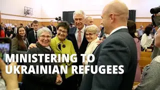 Elder Uchtdorf Ministers to Ukrainian Refugees in Poland