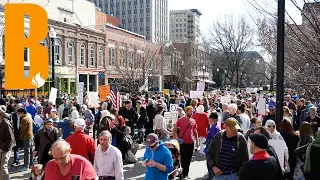 1,100 silently march in Market Square - Beacon News