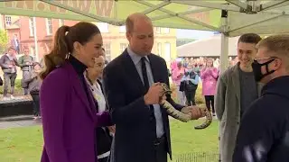 Britain's Kate and William hold tarantula and python