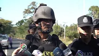 Thai bomb disposal team checks if Cambodian rocket in road had fully exploded