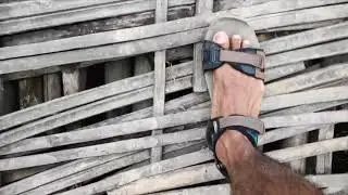 Walking on shaking Bamboo bridge over flooded river in Assam