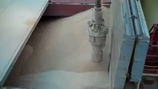 Loading grain onto a cargo ship. Grain exports from Russia. Azov sea port. IEC.