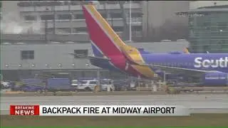 Backpack catches fire on aircraft at Midway Airport
