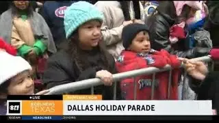 Families having fun at the Dallas Holiday Parade
