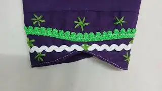 sleeve design with green floral embroidery and wavy lace detailing