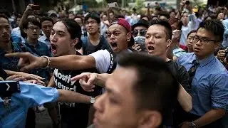 Clashes in Hong Kong as pro-democracy barricades are removed