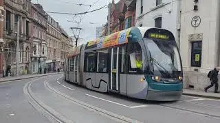 Nottingham Express Transit 209 approaching Royal Centre with failed fellow stablemate 210 in tow
