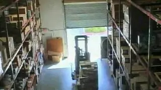 Crashing Through Warehouse Door With Forklift