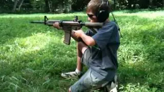 8 Year old fires a Head Down BR rifle with ease