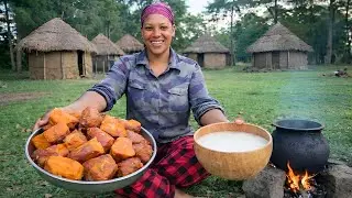 Cooking African Breakfast on Firewood in an  African Village