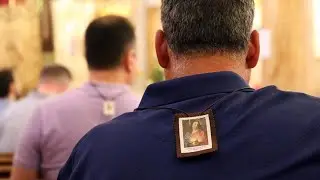 You should wear the Brown Scapular