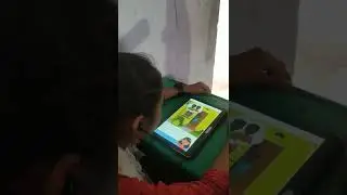 reading English stories with the help of Tab  Bolo Read Along mobile app by google student zp school