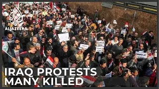 Tensions flare as unidentified gunmen kill protesters in Baghdad
