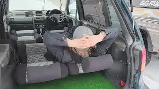 Funny Car Salesman showcases interior bed! Mitsubishi EVO Van