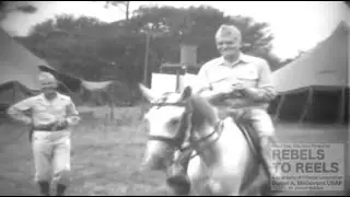 Admiral Halsey rides the Emperor's white horse.  Footage shot by Lt. Dan McGovern. Sept  16th 1945.