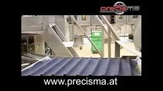 Tray cleaner for automatic baking lines.
