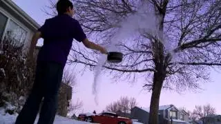 Boiling Water into Snow and Steam in Slow Motion in Cold Colorado Weather