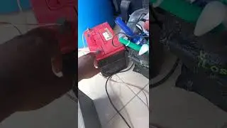 Charging car battery using a UPS