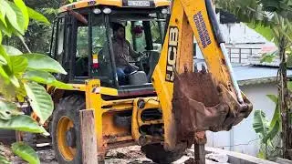 Jcb 3dx levelling soil for making new road to property 