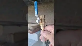 Using a water level to level the house