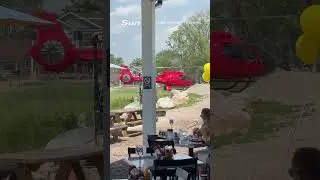 Dramatic moment helicopter flips upon landing in Michigan