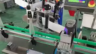 The Model RXL-DW Pneumtic Clamp Orientation Sticker Type Label Applicator Machine Demo of RICIO 锥形瓶