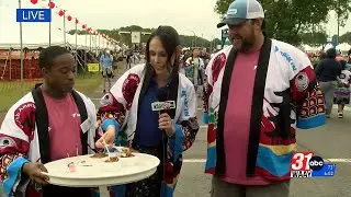 WAAY 31 Meteorologist Amber Kulick tries the cuisine at the Daikin Festival