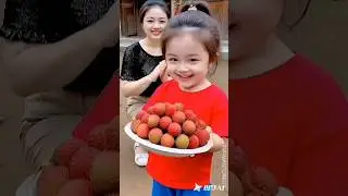 Beautiful Mom Teaches Cute Baby to Share Fresh Lychee