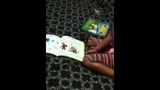 Arya pretending to be reading...And Netra with her non stop