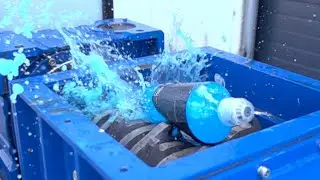 Shredder slow motion - Destroying drinks in slow motion, Crushing fruit in a shredder in slow motion