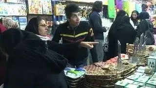 Iranians desperate for sanctions relief cheer nuclear deal