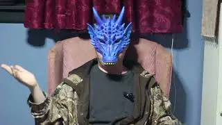 Man in dragon mask talking about funny dragons: Winging it!