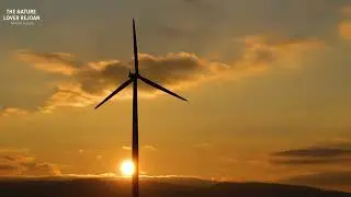 Peaceful Sunset with Wind Turbine | 4K Ultra HD Cinematic Nature's Energy: Stunning 4K Sunset View
