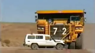 Mega Truck   Dump Truck Runs Over Car