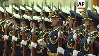 Xi Jinping formally greets President Obama as he begins state visit