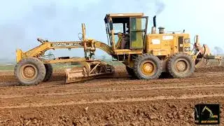 CAT 140G Graeder making A new road
