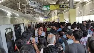 Delhi Metro Yellow Line services delayed during morning rush hour commuters stranded at Hauz Khas st