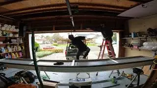 Wood one piece garage door removal with an old friend
